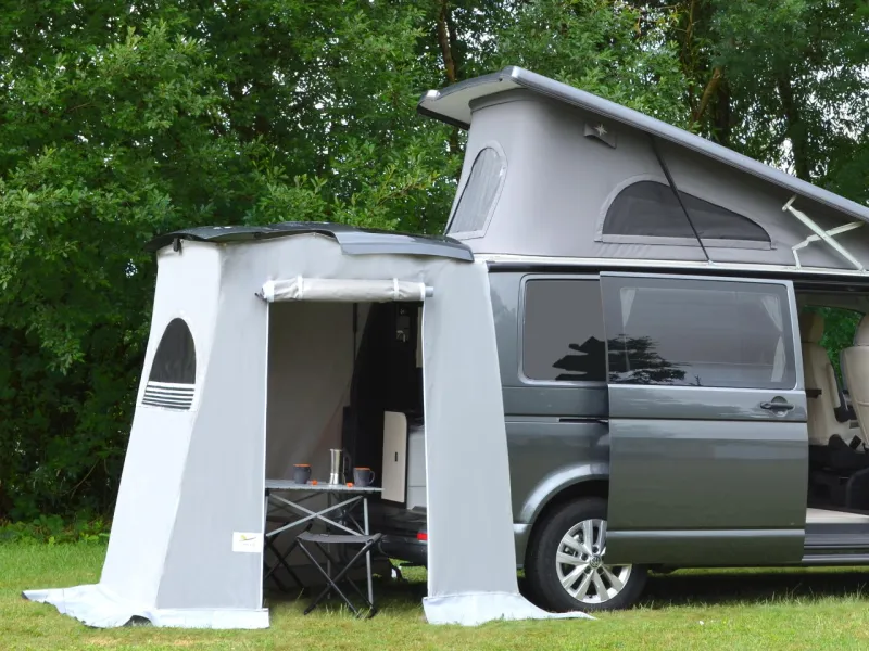 Clairval Spacecamp® rear tent for vans open and mounted on the tailgate of a compact van